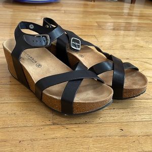 Wedges made in Spain. Black straps